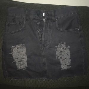 black ripped denim skirt